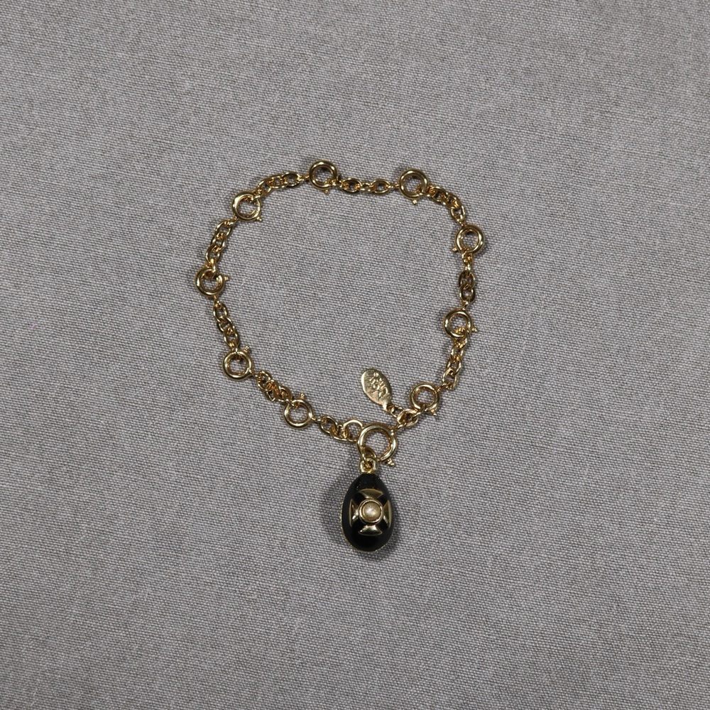Costume jewelry Joan rivers gold toned Easter egg bracelet charm